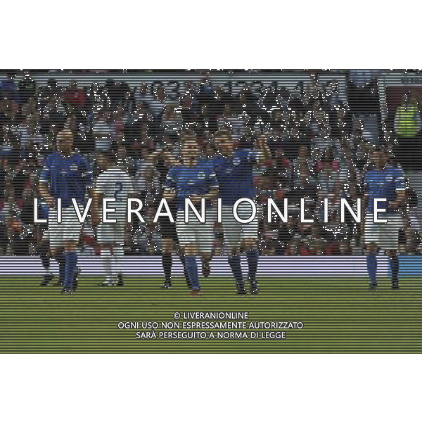 Soccer Aid at Old Trafford Football Club Manchester on 8th June 2014. Nicky Byrne celebrates scoring a goal with Sam Worthington. ©PHOTOSHOT/Agenzia Aldo Liverani sas - ITALY ONLY - EDITORIAL USE ONLY - Partita di beneficenza tra l\'Inghilterra e Resto del Mondo con le stelle mondiali del calcio e dello spettacolo all\'Old Trafford, stadio del Manchester United, 8 giugno 2014