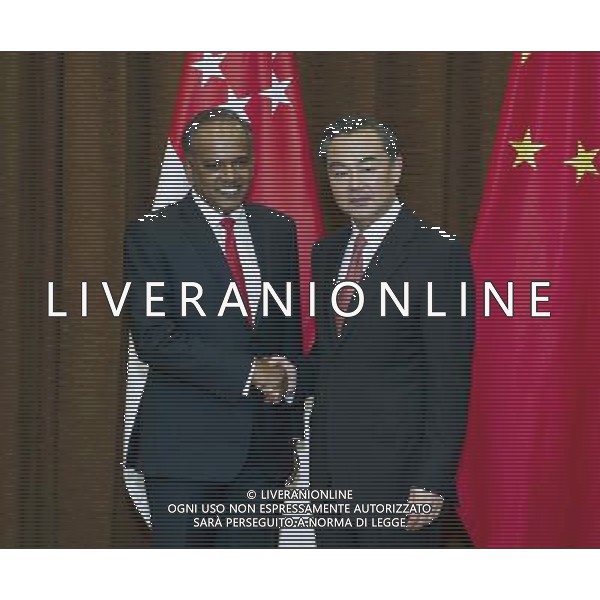(140612) -- BEIJING, June 12, 2014 () -- Chinese Foreign Minister Wang Yi (R) holds talks with his Singaporean counterpart K. Shanmugam in Beijing, capital of China, June 12, 2014. (/Wang Ye) (zc) ©photoshot/Agenzia Aldo Liverani sas - ITALY ONLY - EDITORIAL USE ONLY