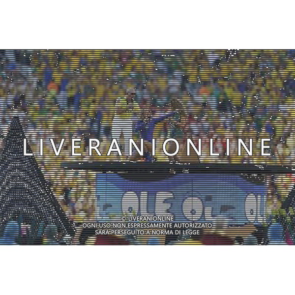 (140612) -- SAO PAULO, June 12, 2014 () -- Rapper Pitbull (L), Claudia Leitte (C) and Jennifer Lopez (R) perform during the opening ceremony of 2014 FIFA World Cup in the Arena de Sao Paulo Stadium in Sao Paulo, Brazil, June 12, 2014. (/Wang Lili)(rh) AG ALDO LIVERANI SAS ONLY ITALY