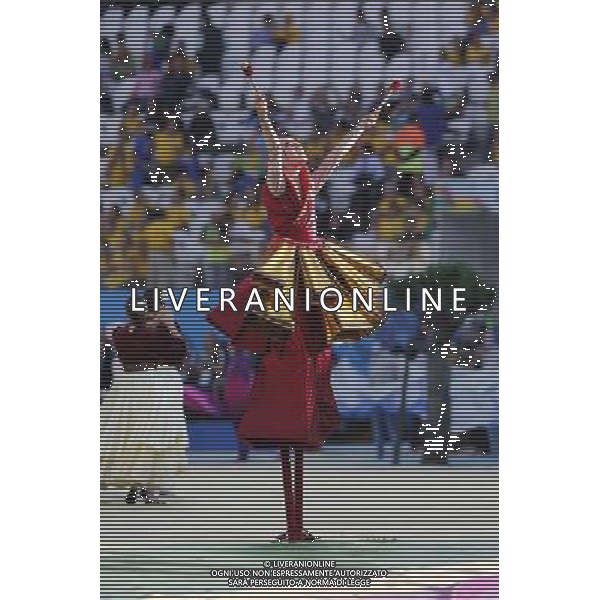 (140612) -- SAO PAULO, June 12, 2014 () -- A performer gives a show during the opening ceremony of 2014 FIFA World Cup in the Arena de Sao Paulo Stadium in Sao Paulo, Brazil, June 12, 2014. (/Zhou Lei)(rh) AG ALDO LIVERANI SAS ONLY ITALY