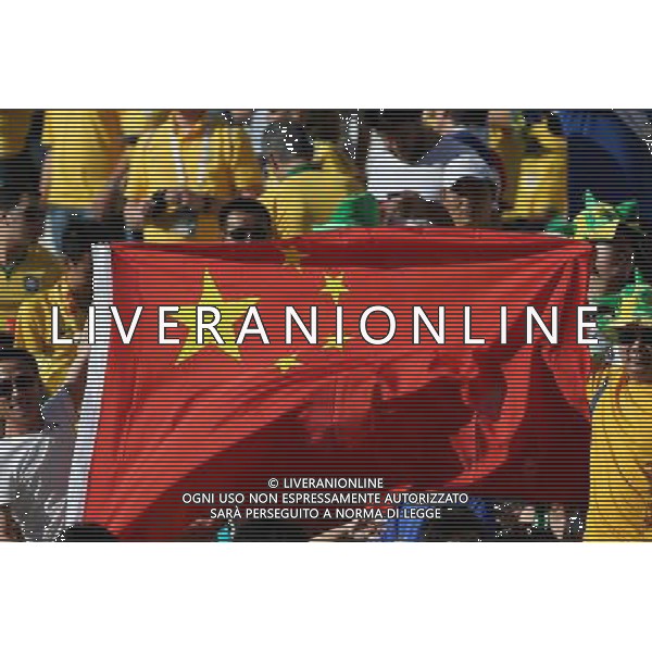 (140612) -- SAO PAULO, June 12, 2014 () -- Chinese football fans enter into the Arena de Sao Paulo Stadium before the opening match of 2014 FIFA World Cup in Sao Paulo, Brazil, June 12, 2014. (/Xu Zijian)(rh) AG ALDO LIVERANI SAS ONLY ITALY