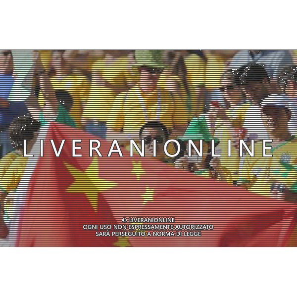 (140612) -- SAO PAULO, June 12, 2014 () -- Chinese football fans enter into the Arena de Sao Paulo Stadium before the opening match of 2014 FIFA World Cup in Sao Paulo, Brazil, June 12, 2014. (/Xu Zijian)(rh) AG ALDO LIVERANI SAS ONLY ITALY