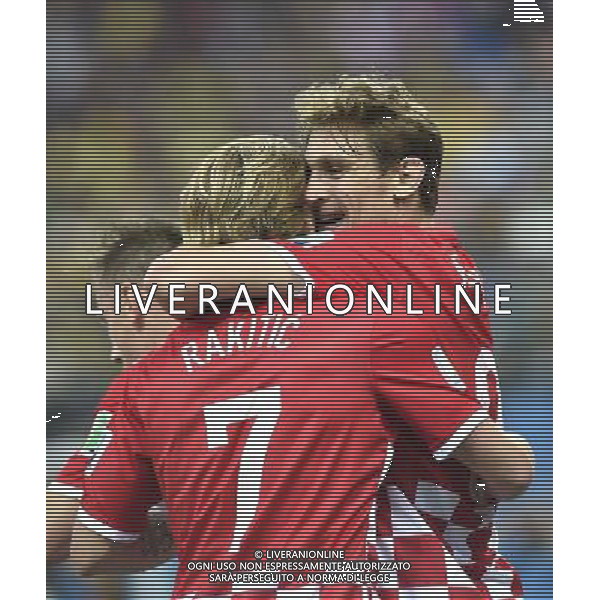 (140612) -- SAO PAULO, June 12, 2014 () -- Croatia\'s Ivan Rakitic (L) and Nikica Jelavic (R) celebrate for their first goal during the opening match of 2014 FIFA World Cup in the Arena de Sao Paulo Stadium in Sao Paulo, Brazil, June 12, 2014. (/Qi Heng)(rh) AG ALDO LIVERANI SAS ONLY ITALY