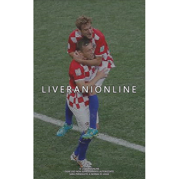 (140612) -- SAO PAULO, June 12, 2014 () -- Croatia\'s Nikica Jelavic celebrates (back) after Brazil\'s own goal during the opening match of 2014 FIFA World Cup in the Arena de Sao Paulo Stadium in Sao Paulo, Brazil, June 12, 2014.(/Liao Yujie)(pcy) AG ALDO LIVERANI SAS ONLY ITALY