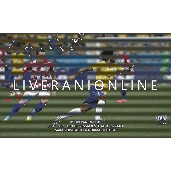 (140612) -- SAO PAULO, June 12, 2014 () -- Brazil\'s Marcelo controls the ball during the opening match of 2014 FIFA World Cup in the Arena de Sao Paulo Stadium in Sao Paulo, Brazil, June 12, 2014. (/Zhou Lei)(rh) AG ALDO LIVERANI SAS ONLY ITALY