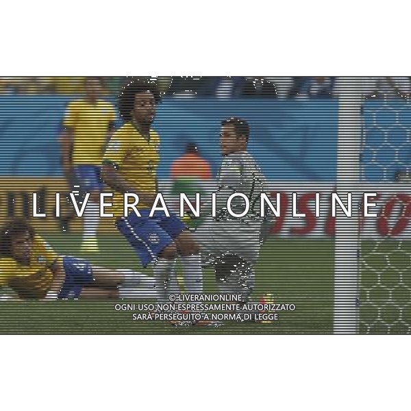 (140612) -- SAO PAULO, June 12, 2014 () -- Brazil\'s Marcelo (C) reacts after he kicked the ball into his team\'s gate during the opening match of 2014 FIFA World Cup in the Arena de Sao Paulo Stadium in Sao Paulo, Brazil, June 12, 2014. (/Zhou Lei)(rh) AG ALDO LIVERANI SAS ONLY ITALY