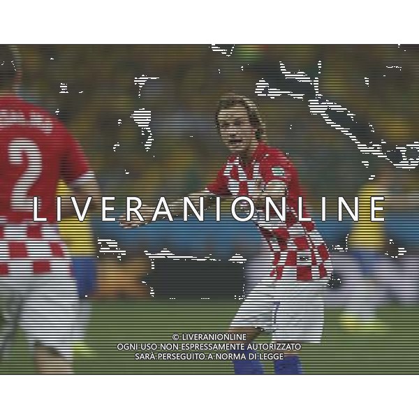 (140612) -- SAO PAULO, June 12, 2014 () -- Croatia\'s Ivan Rakitic reacts during the opening match of 2014 FIFA World Cup in the Arena de Sao Paulo Stadium in Sao Paulo, Brazil, June 12, 2014. (/Wang Lili)(rh) AG ALDO LIVERANI SAS ONLY ITALY