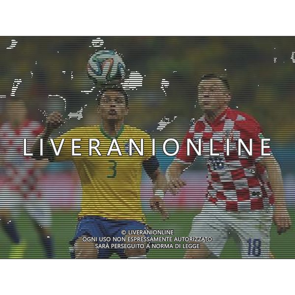 (140612) -- SAO PAULO, June 12, 2014 () -- Brazil\'s Thiago Silva (L) competes to gain control of the ball against Croatia\'s Ivica Olic during the opening match of 2014 FIFA World Cup in the Arena de Sao Paulo Stadium in Sao Paulo, Brazil, June 12, 2014.(/Xu Zijian)(pcy) AG ALDO LIVERANI SAS ONLY ITALY