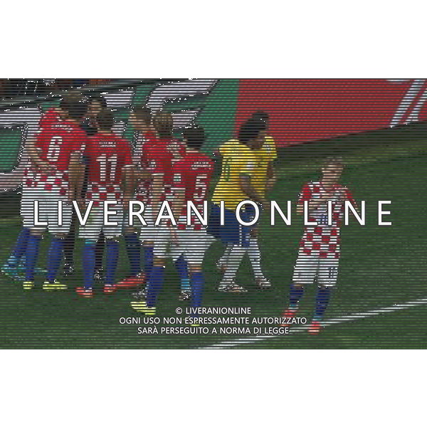 (140612) -- SAO PAULO, June 12, 2014 () -- Croatia\'s players argue with referee Yuichi Nishimura after he gave Brazil a penalty kick during the opening match of 2014 FIFA World Cup in the Arena de Sao Paulo Stadium in Sao Paulo, Brazil, June 12, 2014.(/Liao Yujie)(pcy) AG ALDO LIVERANI SAS ONLY ITALY