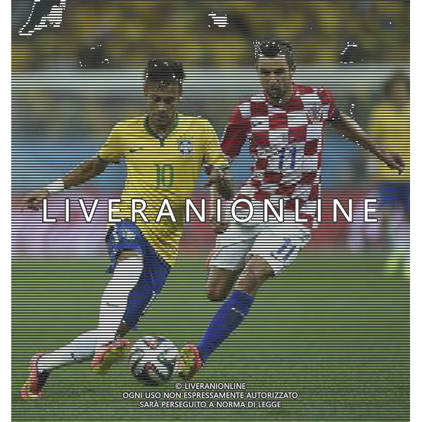 (140612) -- SAO PAULO, June 12, 2014 () -- Brazil\'s Neymar vies with Croatia\'s Darijo Srna during the opening match of 2014 FIFA World Cup in the Arena de Sao Paulo Stadium in Sao Paulo, Brazil, June 12, 2014. Brazil won 3-1 over Croatia on Thursday. (/Qi Heng)(rh) AG ALDO LIVERANI SAS ONLY ITALY