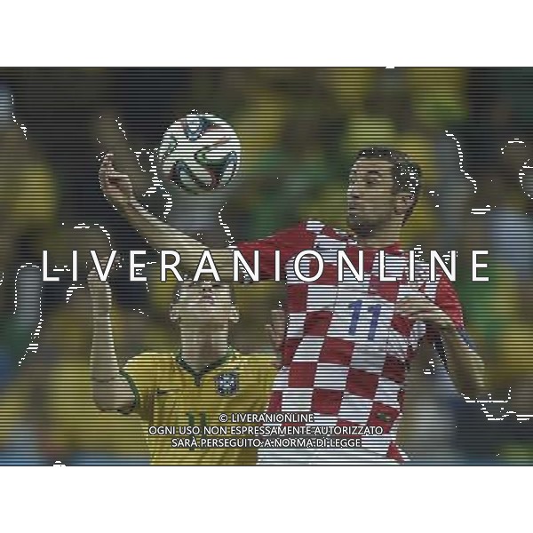 (140612) -- SAO PAULO, June 12, 2014 () -- Brazil\'s Oscar vies with Croatia\'s Darijo Srna during the opening match of 2014 FIFA World Cup in the Arena de Sao Paulo Stadium in Sao Paulo, Brazil, June 12, 2014. Brazil won 3-1 over Croatia on Thursday. (/Qi Heng)(rh) AG ALDO LIVERANI SAS ONLY ITALY