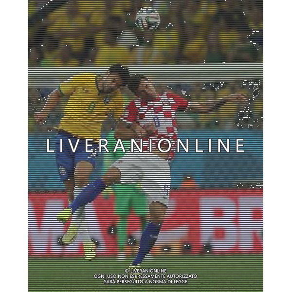 (140612) -- SAO PAULO, June 12, 2014 () -- Croatia\'s Dejan Lovren (R) competes with Brazil\'s Fred during the opening match of 2014 FIFA World Cup in the Arena de Sao Paulo Stadium in Sao Paulo, Brazil, June 12, 2014. Brazil won 3-1 over Croatia on Thursday. (/Xu Zijian)(pcy) AG ALDO LIVERANI SAS ONLY ITALY