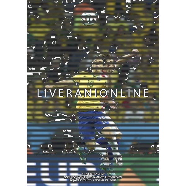 (140612) -- SAO PAULO, June 12, 2014 () -- Brazil\'s Hernanes competes a head ball with Croatia\'s player during the opening match of 2014 FIFA World Cup in the Arena de Sao Paulo Stadium in Sao Paulo, Brazil, June 12, 2014. Brazil won 3-1 over Croatia. (/Qi Heng)(rh) AG ALDO LIVERANI SAS ONLY ITALY