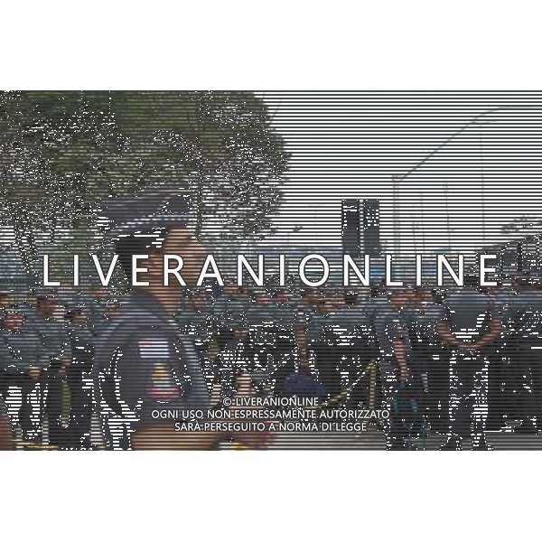 (140612) -- BRAZIL, SAO PAULO, June 12, 2014 () -- Local police stand guard Sao Paulo Arena before the opening ceremony of the World Cup 2014 in Sao Paulo, Brazil, on June 12, 2014. (/ Rahel Patrasso) (rh) ©PHOTOSHOT/Agenzia Aldo Liverani sas - ITALY ONLY - EDITORIAL USE ONLY - Soldati e polizia locale di guardia prima della cerimonia di apertura della Coppa del Mondo FIFA 2014 a Sao Paolo, in Brasile, il 12 giugno 2014