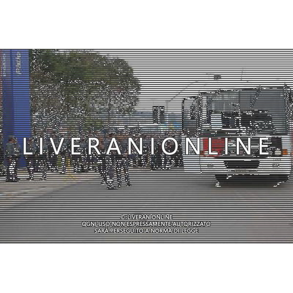 (140612) -- BRAZIL, SAO PAULO, June 12, 2014 () -- Local police gather around the Arena de Sao Paulo Stadium before the opening ceremony of the World Cup 2014 in Sao Paulo, Brazil, on June 12, 2014. (/ Rahel Patrasso) (rh) ©PHOTOSHOT/Agenzia Aldo Liverani sas - ITALY ONLY - EDITORIAL USE ONLY - Soldati e polizia locale di guardia prima della cerimonia di apertura della Coppa del Mondo FIFA 2014 a Sao Paolo, in Brasile, il 12 giugno 2014