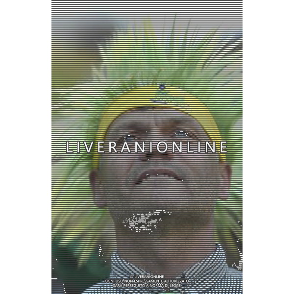 (140612) -- SAO PAULO, June 12, 2014 () -- A fan of Brazil watches the opening match of 2014 FIFA World Cup in the Arena de Sao Paulo Stadium in Sao Paulo, Brazil, June 12, 2014. Brazil won 3-1 over Croatia on Thursday. (/Qi Heng)(rh) ©PHOTOSHOT/Agenzia Aldo Liverani sas - ITALY ONLY - EDITORIAL USE ONLY - Brasile - Croazia partita di apertura della FIFA World Cup Brasile 2014 Gruppo A San Paolo - 12 giugno 2014