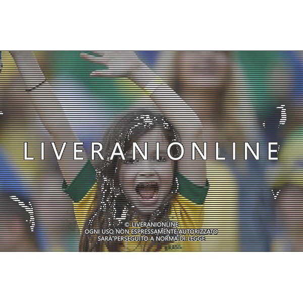 (140612) -- SAO PAULO, June 12, 2014 () -- A little fan of Brazil cheers for her team during the opening match of 2014 FIFA World Cup in the Arena de Sao Paulo Stadium in Sao Paulo, Brazil, June 12, 2014. Brazil won 3-1 over Croatia on Thursday. (/Wang Lili)(rh) ©PHOTOSHOT/Agenzia Aldo Liverani sas - ITALY ONLY - EDITORIAL USE ONLY - Brasile - Croazia partita di apertura della FIFA World Cup Brasile 2014 Gruppo A San Paolo - 12 giugno 2014