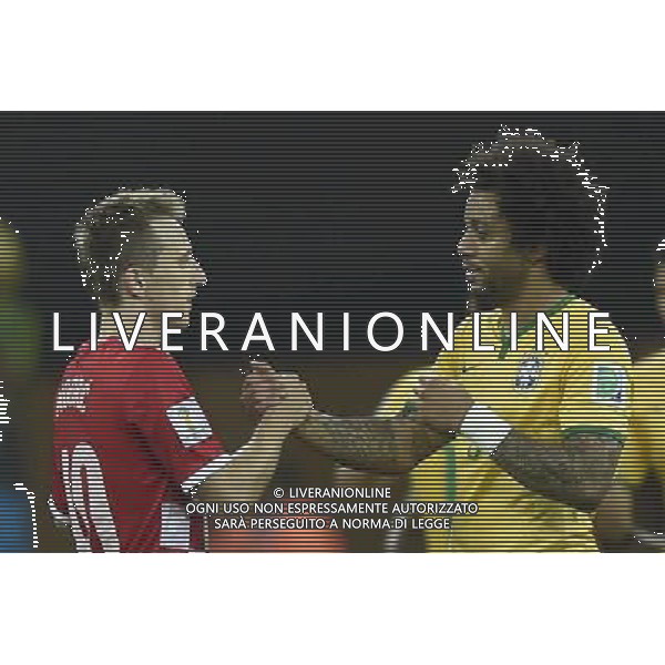 (140612) -- SAO PAULO, June 12, 2014 () -- Brazil\'s Marcelo shakes hands with Croatia\'s Luka Modric during the opening match of 2014 FIFA World Cup in the Arena de Sao Paulo Stadium in Sao Paulo, Brazil, June 12, 2014. Brazil won 3-1 over Croatia on Thursday. (/Qi Heng)(rh) ©PHOTOSHOT/Agenzia Aldo Liverani sas - ITALY ONLY - EDITORIAL USE ONLY - Brasile - Croazia partita di apertura della FIFA World Cup Brasile 2014 Gruppo A San Paolo - 12 giugno 2014