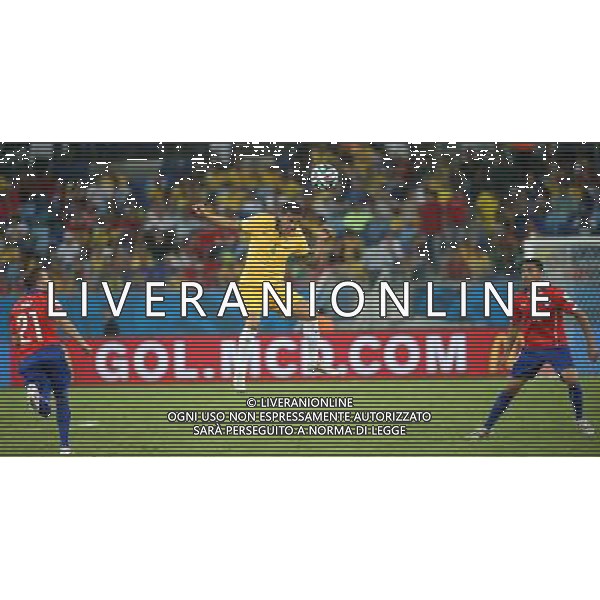 (140613) -- CUIABA, June 13, 2014 () -- Australia\'s Tim Cahill jumps for a headball during a Group B match between Chile and Australia of 2014 FIFA World Cup in the Arena Pantanal Stadium in Cuiaba, Brazil, June 13, 2014. (/Li Ming)(rh) ©photoshot/Agenzia Aldo Liverani sas - ITALY ONLY - EDITORIAL USE ONLY - Cile v Australia partita del Gruppo B Coppa del mondo FIFA World Cup nel Pantanal stadio Arena di Cuiaba, Brasile, 13 giugno 2014