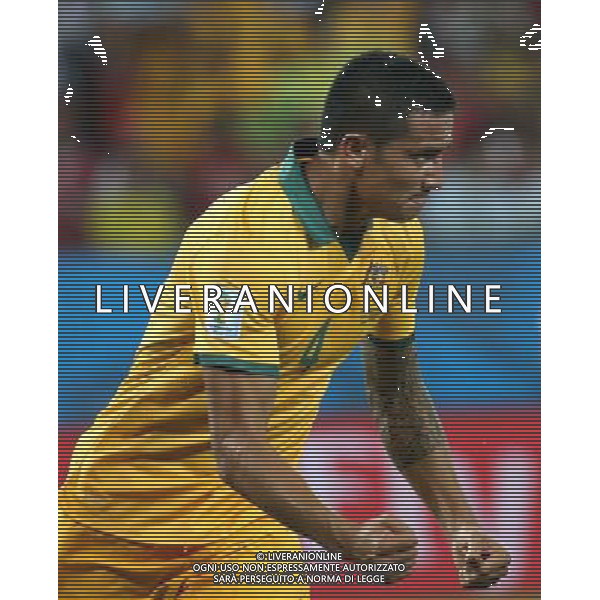 (140613) -- CUIABA, June 13, 2014 () -- Australia\'s Tim Cahill celebrates the goal during a Group B match between Chile and Australia of 2014 FIFA World Cup in the Arena Pantanal Stadium in Cuiaba, Brazil, June 13, 2014. (/Li Ming)(rh) ©photoshot/Agenzia Aldo Liverani sas - ITALY ONLY - EDITORIAL USE ONLY - Cile v Australia partita del Gruppo B Coppa del mondo FIFA World Cup nel Pantanal stadio Arena di Cuiaba, Brasile, 13 giugno 2014