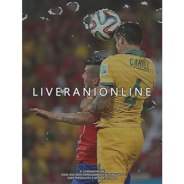 (140613) -- CUIABA, June 13, 2014 () -- Australia\'s Tim Cahill jumps and scores a headball goal during a Group B match between Chile and Australia of 2014 FIFA World Cup in the Arena Pantanal Stadium in Cuiaba, Brazil, June 13, 2014. (/Li Ming)(rh) ©photoshot/Agenzia Aldo Liverani sas - ITALY ONLY - EDITORIAL USE ONLY - Cile v Australia partita del Gruppo B Coppa del mondo FIFA World Cup nel Pantanal stadio Arena di Cuiaba, Brasile, 13 giugno 2014