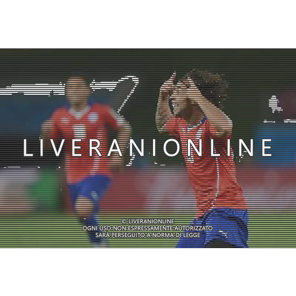 (140613) -- CUIABA, June 13, 2014 () -- Chile\'s Jorge Valdivia celebrates the goal during a Group B match between Chile and Australia of 2014 FIFA World Cup in the Arena Pantanal Stadium in Cuiaba, Brazil, June 13, 2014. (/Liu Dawei)(rh) ©photoshot/Agenzia Aldo Liverani sas - ITALY ONLY - EDITORIAL USE ONLY - Cile v Australia partita del Gruppo B Coppa del mondo FIFA World Cup nel Pantanal stadio Arena di Cuiaba, Brasile, 13 giugno 2014