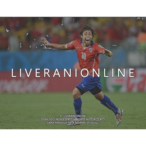 (140613) -- CUIABA, June 13, 2014 () -- Chile\'s Jorge Valdivia celebrates the goal during a Group B match between Chile and Australia of 2014 FIFA World Cup in the Arena Pantanal Stadium in Cuiaba, Brazil, June 13, 2014. (/Liu Dawei)(rh) ©photoshot/Agenzia Aldo Liverani sas - ITALY ONLY - EDITORIAL USE ONLY - Cile v Australia partita del Gruppo B Coppa del mondo FIFA World Cup nel Pantanal stadio Arena di Cuiaba, Brasile, 13 giugno 2014