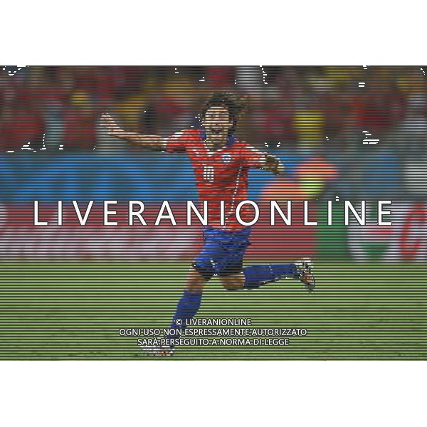 (140613) -- CUIABA, June 13, 2014 () -- Chile\'s Jorge Valdivia celebrates the goal during a Group B match between Chile and Australia of 2014 FIFA World Cup in the Arena Pantanal Stadium in Cuiaba, Brazil, June 13, 2014. (/Liu Dawei)(rh) ©photoshot/Agenzia Aldo Liverani sas - ITALY ONLY - EDITORIAL USE ONLY - Cile v Australia partita del Gruppo B Coppa del mondo FIFA World Cup nel Pantanal stadio Arena di Cuiaba, Brasile, 13 giugno 2014