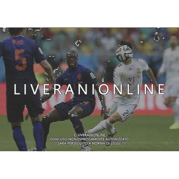 (140613) -- SALVADOR, June 13, 2014 () -- Spain\'s David Silva vies with Netherlands\'s Bruno Martins Indi during a Group B match between Spain and Netherlands of 2014 FIFA World Cup in the Arena Fonte Nova Stadium in Salvador, Brazil, June 13, 2014. (/Yang Lei)(rh) ©photoshot/Agenzia Aldo Liverani sas - ITALY ONLY - EDITORIAL USE ONLY - Spagna Vs Olanda partita del Gruppo B Coppa del Mondo FIFA 2014 in Salvador, in Brasile, 13 giugno 2014