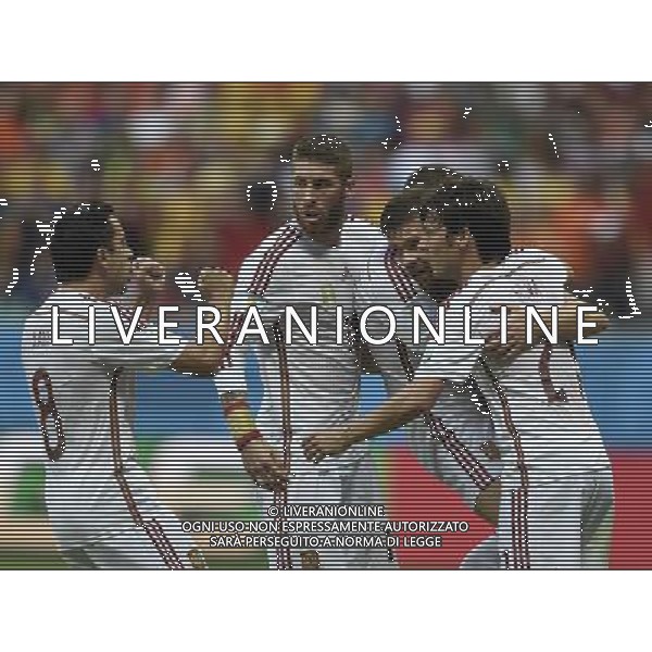 (140613) -- SALVADOR, June 13, 2014 () -- Spain\'s players celebrate the scoring of a penalty kick during a Group B match between Spain and Netherlands of 2014 FIFA World Cup in the Arena Fonte Nova Stadium in Salvador, Brazil, June 13, 2014. (/Yang Lei)(rh) ©photoshot/Agenzia Aldo Liverani sas - ITALY ONLY - EDITORIAL USE ONLY - Spagna Vs Olanda partita del Gruppo B Coppa del Mondo FIFA 2014 in Salvador, in Brasile, 13 giugno 2014