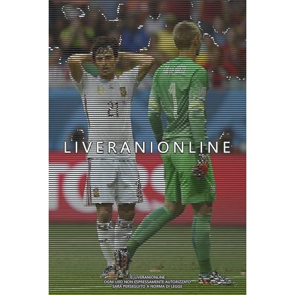 (140613) -- SALVADOR, June 13, 2014 () -- Spain\'s David Silva (L) reacts during a Group B match between Spain and Netherlands of 2014 FIFA World Cup in the Arena Fonte Nova Stadium in Salvador, Brazil, June 13, 2014. (/Yang Lei)(rh) ©photoshot/Agenzia Aldo Liverani sas - ITALY ONLY - EDITORIAL USE ONLY - Spagna Vs Olanda partita del Gruppo B Coppa del Mondo FIFA 2014 in Salvador, in Brasile, 13 giugno 2014