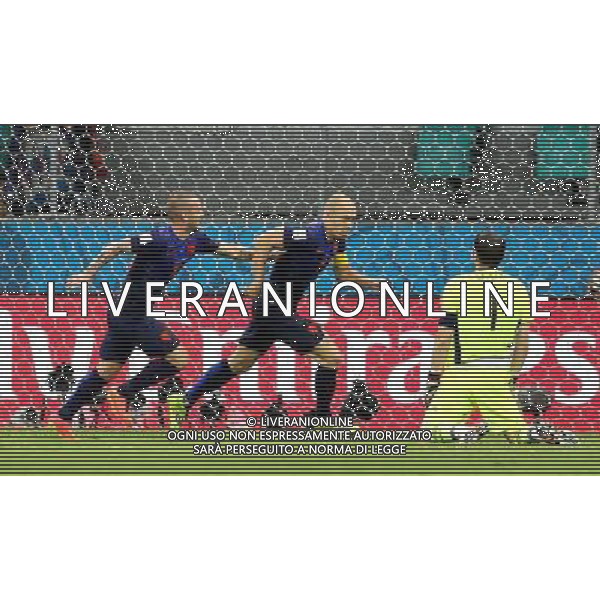 (140613) -- SALVADOR, June 13, 2014 () -- Netherlands\' Arjen Robben (C) reacts after scoring his second goal, Netherlands\' fifth goal, at the Arena Fonte Nova Stadium during a Group B match between Spain and Netherlands of 2014 FIFA World Cup in Salvador, Brazil, June 13, 2014. Netherlands won 5-1 over Spain on Friday. (/Cao Can) ©photoshot/Agenzia Aldo Liverani sas - ITALY ONLY - EDITORIAL USE ONLY - Spagna Vs Olanda partita del Gruppo B Coppa del Mondo FIFA 2014 in Salvador, in Brasile, 13 giugno 2014