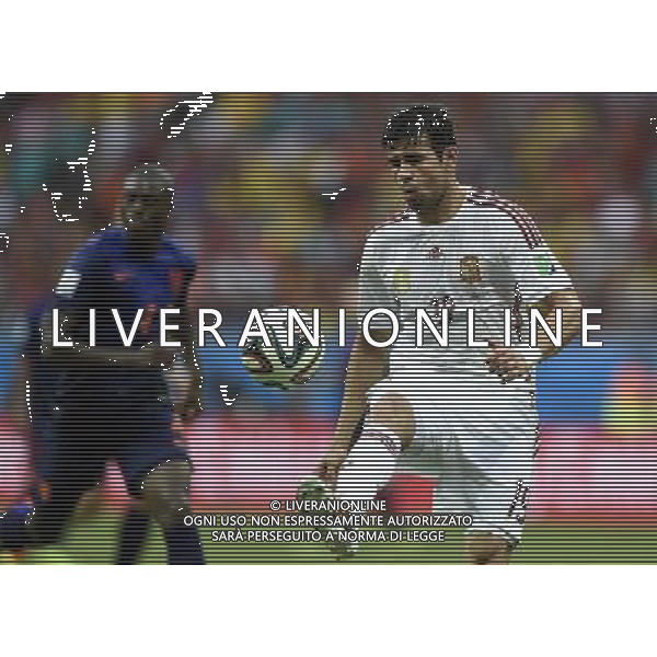 (140613) -- SALVADOR, June 13, 2014 () -- Spain\'s Diego Costa controls the ball during a Group B match between Spain and Netherlands of 2014 FIFA World Cup in the Arena Fonte Nova Stadium in Salvador, Brazil, June 13, 2014. (/Yang Lei)(rh) ©photoshot/Agenzia Aldo Liverani sas - ITALY ONLY - EDITORIAL USE ONLY - Spagna Vs Olanda partita del Gruppo B Coppa del Mondo FIFA 2014 in Salvador, in Brasile, 13 giugno 2014