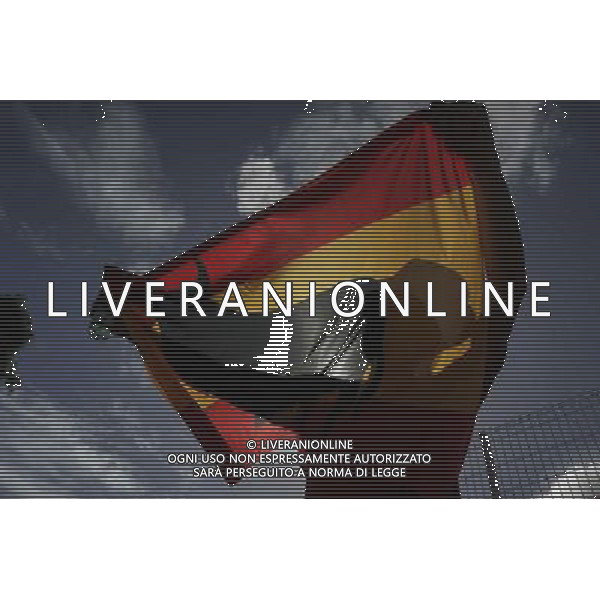 (140613) -- SALVADOR, June 13, 2014 () -- A spain\'s fan waves a flag outside the Arena Fonte Nova Stadium where a Group B match between Spain and Netherlands of 2014 FIFA World Cup is held in Salvador, Brazil, June 13, 2014. Netherlands won 5-1 over Spain on Friday. (/Jhon Paz) ©photoshot/Agenzia Aldo Liverani sas - ITALY ONLY - EDITORIAL USE ONLY - Spagna Vs Olanda partita del Gruppo B Coppa del Mondo FIFA 2014 in Salvador, in Brasile, 13 giugno 2014