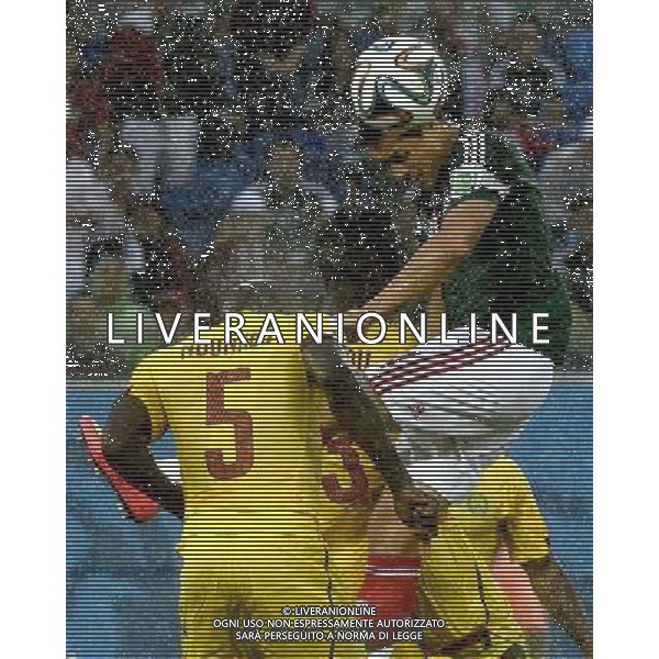 (140613) -- NATAL, June 13, 2014 () -- Mexico\'s Javier Hernandez (R) jumps for heading the ball during a Group A match between Mexico and Cameroon of 2014 FIFA World Cup at the Estadio das Dunas Stadium in Natal, Brazil, June 13, 2014. (/Lui Siu Wai)(pcy) ©photoshot/Agenzia Aldo Liverani sas - ITALY ONLY - EDITORIAL USE ONLY - Messico v Camerun partita del Gruppo A Coppa del Mondo FIFA 2014 in Estadio das Dunas Stadium a Natal, Brasile, 13 giugno 2014