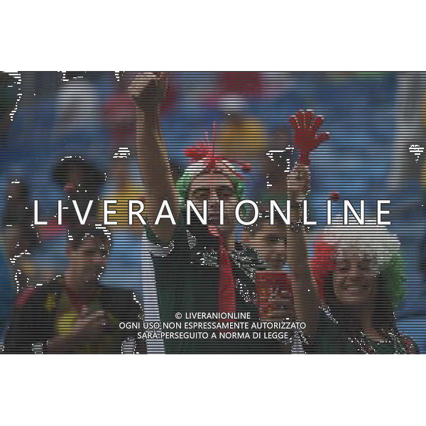 (140613) -- NATAL, June 13, 2014 () -- Mexico\'s football fans gesture at the Estadio das Dunas Stadium where a Group A match between Mexico and Cameroon of 2014 FIFA World Cup will be held, in Natal, Brazil, June 13, 2014. (/Guo Yong)(rh) ©photoshot/Agenzia Aldo Liverani sas - ITALY ONLY - EDITORIAL USE ONLY - Messico v Camerun partita del Gruppo A Coppa del Mondo FIFA 2014 in Estadio das Dunas Stadium a Natal, Brasile, 13 giugno 2014