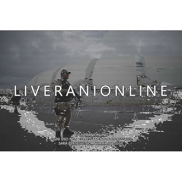 (140613) -- NATAL, June 13, 2014 () -- A police officer stands guard at the peripheral area of the Estadio Das Dunas Stadium where Mexico will play against Cameroon in the city of Natal, Brazil, on June 13, 2014. (/Mauricio Valenzuela) (rh) ©photoshot/Agenzia Aldo Liverani sas - ITALY ONLY - EDITORIAL USE ONLY - Messico v Camerun partita del Gruppo A Coppa del Mondo FIFA 2014 in Estadio das Dunas Stadium a Natal, Brasile, 13 giugno 2014