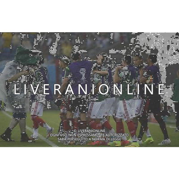 (140613) -- NATAL, June 13, 2014 () -- Mexico\'s players celebrate their victory after a Group A match between Mexico and Cameroon of 2014 FIFA World Cup in the Estadio das Dunas Stadium in NATAL, Brazil, June 13, 2014. Mexico won 1-0 over Cameroon on Friday.(/Lui Siu Wai)(rh) ©photoshot/Agenzia Aldo Liverani sas - ITALY ONLY - EDITORIAL USE ONLY - Messico v Camerun partita del Gruppo A Coppa del Mondo FIFA 2014 in Estadio das Dunas Stadium a Natal, Brasile, 13 giugno 2014