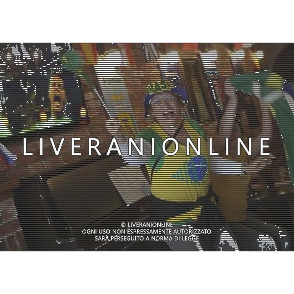 (140613) -- VANCOUVER, June 13, 2014 () -- Fans react while watching the televised World Cup opening match between Brazil and Croatia, at a restaurant in Vancouver, Canada, June 12, 2014. (/Liang Sen) ©photoshot/Agenzia Aldo Liverani sas - ITALY ONLY - EDITORIAL USE ONLY - L\'esultanza dei tifosi per la partita di apertura tra Brasile e Croazia Coppa del Mondo FIFA WORLD CUP BRASILE 12 giugno 2014