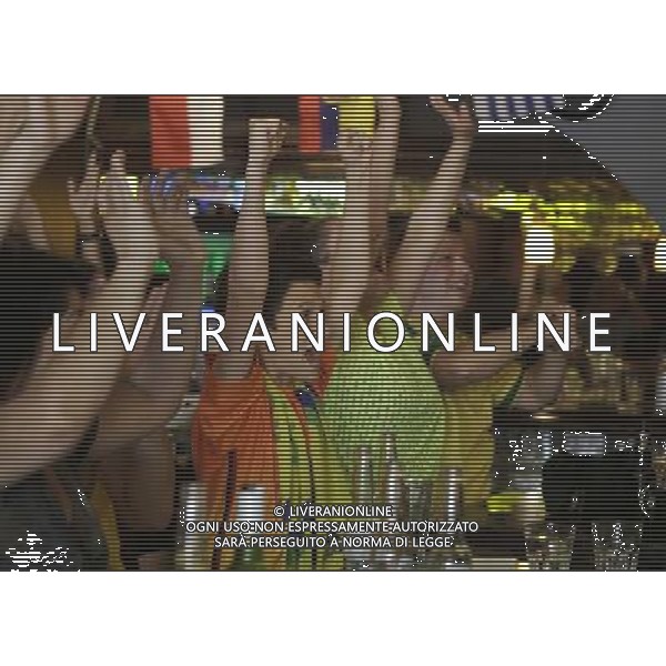 (140613) -- VANCOUVER, June 13, 2014 () -- Fans cheer while watching the televised World Cup opening match between Brazil and Croatia, at a restaurant in Vancouver, Canada, June 12, 2014. (/Liang Sen) ©photoshot/Agenzia Aldo Liverani sas - ITALY ONLY - EDITORIAL USE ONLY - L\'esultanza dei tifosi per la partita di apertura tra Brasile e Croazia Coppa del Mondo FIFA WORLD CUP BRASILE 12 giugno 2014