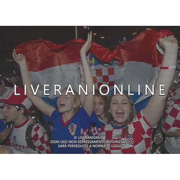 (140613) -- ZAGREB, June 13, 2014 () -- Croatian soccer fans cheer while watching the televised match between Croatia and Brazil, in Zagreb, Croatia, June 12, 2014. Thousands of fans on Thursday watched the FIFA World Cup opening match on a big screen at Zagreb\'s central square. (/Miso Lisanin) ©photoshot/Agenzia Aldo Liverani sas - ITALY ONLY - EDITORIAL USE ONLY - L\'esultanza dei tifosi per la partita di apertura tra Brasile e Croazia Coppa del Mondo FIFA WORLD CUP BRASILE 12 giugno 2014