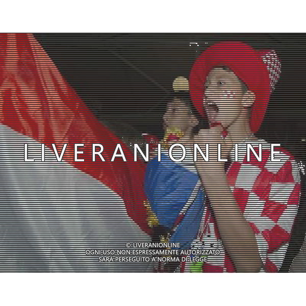 (140613) -- ZAGREB, June 13, 2014 () -- Croatian soccer fans react while watching the televised match between Croatia and Brazil, in Zagreb, Croatia, June 12, 2014. Thousands of fans on Thursday watched the FIFA World Cup opening match on a big screen at Zagreb\'s central square. (/Miso Lisanin) ©photoshot/Agenzia Aldo Liverani sas - ITALY ONLY - EDITORIAL USE ONLY - L\'esultanza dei tifosi per la partita di apertura tra Brasile e Croazia Coppa del Mondo FIFA WORLD CUP BRASILE 12 giugno 2014