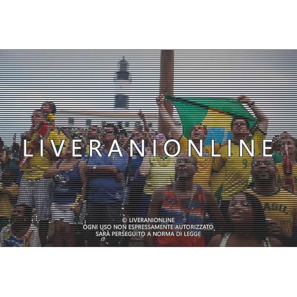 (140612) -- SALVADOR, June 12, 2014 () -- Brazilian football fans watch the opening match between Brazil and Croatia of 2014 FIFA World Cup at the Farol da Barra in Salvador, Bahia, Brazil,on June 12, 2014. Brazil won 3-1 over Croatia on Thursday. (/Jhon Paz) ©photoshot/Agenzia Aldo Liverani sas - ITALY ONLY - EDITORIAL USE ONLY - L\'esultanza dei tifosi per la partita di apertura tra Brasile e Croazia Coppa del Mondo FIFA WORLD CUP BRASILE 12 giugno 2014