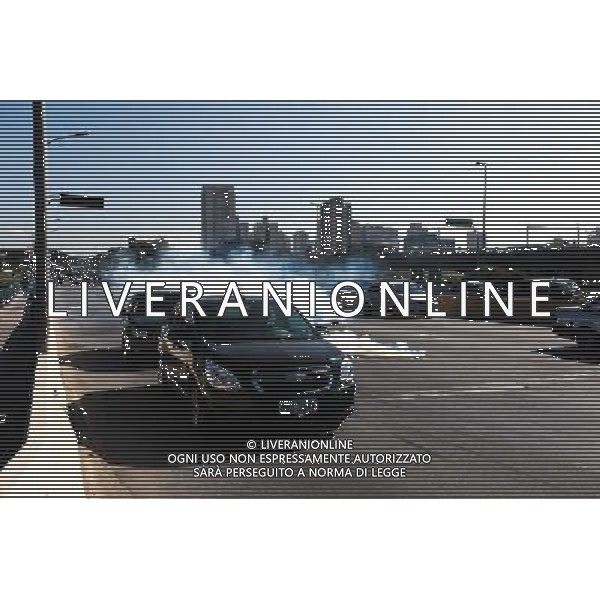 Cars pass by tears gás bombs during demonstration of social movements and groups against the World Cup on June 12, 2014 in Sao Paulo, Brazil. Clashes occurred on the Radial Leste Avenue, a few kilometers from the Itaquerão stadium, where it occurs today the opening match of the World Cup between Brazil and Croatia. (Photo by Tiago Mazza Chiaravalloti/NurPhoto) ©photoshot/Agenzia Aldo Liverani sas - ITALY ONLY - EDITORIAL USE ONLY - Scontri tra manifestanti e polizia durante la manifestazione di Protesta e la dimostrazione dei movimenti sociali a Sao Paulo, in Brasile il 12 giugno 2014 nel giorno della partita inaugurale della Coppa del Mondo Fifa World Cup 