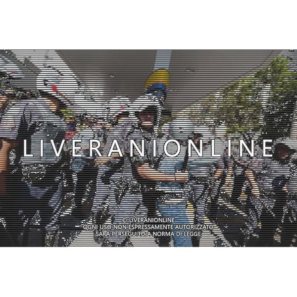 Policeman pushes protester during demonstration of social movements in Sao Paulo, Brazil on June 12, 2014. The demonstration happens near the same avenue that leads to the Itaquerao stadium, where it occurs on the same day, the opening match of the World Cup between Brazil and Croatia. (Photo by Tiago Mazza Chiaravalloti/NurPhoto) ©photoshot/Agenzia Aldo Liverani sas - ITALY ONLY - EDITORIAL USE ONLY - Scontri tra manifestanti e polizia durante la manifestazione di Protesta e la dimostrazione dei movimenti sociali a Sao Paulo, in Brasile il 12 giugno 2014 nel giorno della partita inaugurale della Coppa del Mondo Fifa World Cup 
