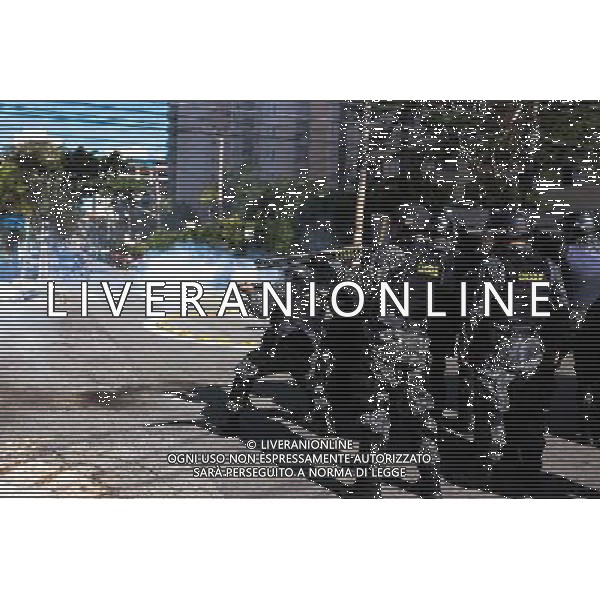 Riot police shoot tear gas during demonstration of social movements and groups against the World Cup on June 12, 2014 in Sao Paulo, Brazil. Clashes occurred on the Radial Leste Avenue, a few kilometers from the Itaquerão stadium, where it occurs today the opening match of the World Cup between Brazil and Croatia. (Photo by Tiago Mazza Chiaravalloti/NurPhoto) ©photoshot/Agenzia Aldo Liverani sas - ITALY ONLY - EDITORIAL USE ONLY - Scontri tra manifestanti e polizia durante la manifestazione di Protesta e la dimostrazione dei movimenti sociali a Sao Paulo, in Brasile il 12 giugno 2014 nel giorno della partita inaugurale della Coppa del Mondo Fifa World Cup 