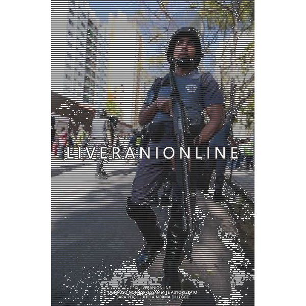 Riot police stand in guard during demonstration of social movements in Sao Paulo, Brazil on June 12, 2014. The demonstration happens near the same avenue that leads to the Itaquerao stadium, where it occurs on the same day, the opening match of the World Cup between Brazil and Croatia. (Photo by Tiago Mazza Chiaravalloti/NurPhoto) ©photoshot/Agenzia Aldo Liverani sas - ITALY ONLY - EDITORIAL USE ONLY - Scontri tra manifestanti e polizia durante la manifestazione di Protesta e la dimostrazione dei movimenti sociali a Sao Paulo, in Brasile il 12 giugno 2014 nel giorno della partita inaugurale della Coppa del Mondo Fifa World Cup 