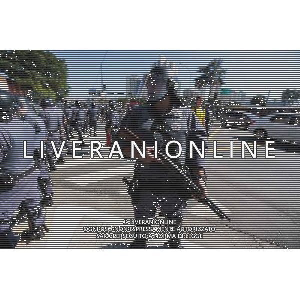 Riot police stand in guard during demonstration of social movements in Sao Paulo, Brazil on June 12, 2014. The demonstration happens near the same avenue that leads to the Itaquerao stadium, where it occurs on the same day, the opening match of the World Cup between Brazil and Croatia. (Photo by Tiago Mazza Chiaravalloti/NurPhoto) ©photoshot/Agenzia Aldo Liverani sas - ITALY ONLY - EDITORIAL USE ONLY - Scontri tra manifestanti e polizia durante la manifestazione di Protesta e la dimostrazione dei movimenti sociali a Sao Paulo, in Brasile il 12 giugno 2014 nel giorno della partita inaugurale della Coppa del Mondo Fifa World Cup 