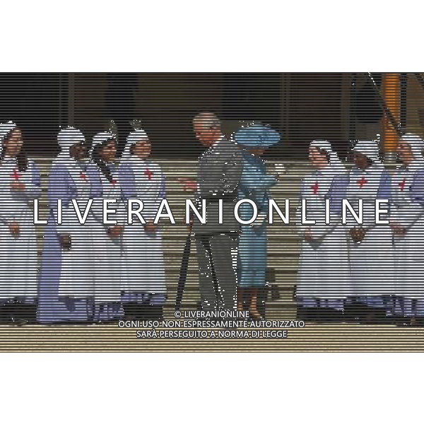 The Prince of Wales, President of the British Red Cross with Deputy President Princess Alexandra pose with nurses dressed in World War 1 uniform during a garden party in honour of the society at Buckingham Palace, London. ©photoshot/Agenzia Aldo Liverani sas - ITALY ONLY - EDITORIAL USE ONLY