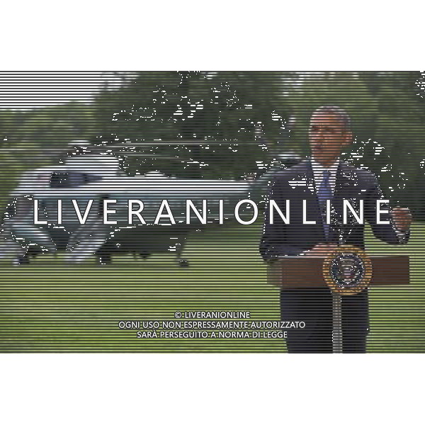 United States President Barack Obama makes a statement on the situation in Iraq prior to departing the South Lawn of the White House for a trip to North Dakota on Friday, June 13, 2014. In his remarks the President said \'We will not be sending US troops back into combat in Iraq,\' but said he has asked his national security team for a \'range of options that he will be reviewing in the days ahead.\' AG ALDO LIVERANI SAS ONLY ITALY
